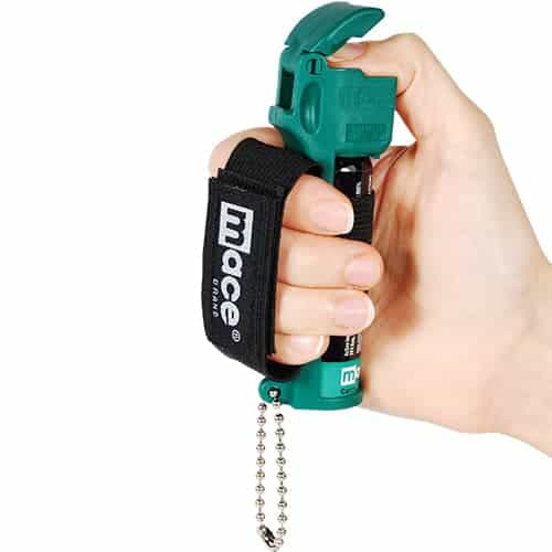 mace dog spray with hand strap in hand