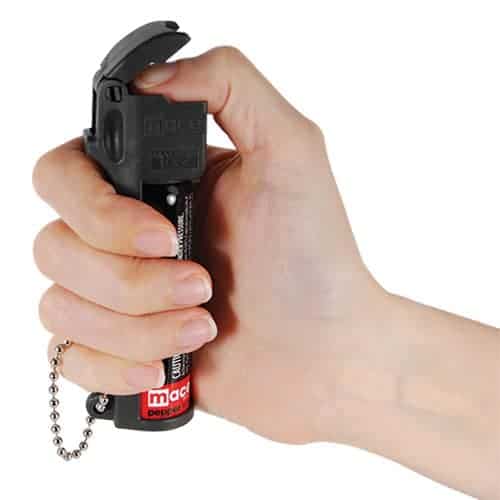 black mace personal pepper spray in hand