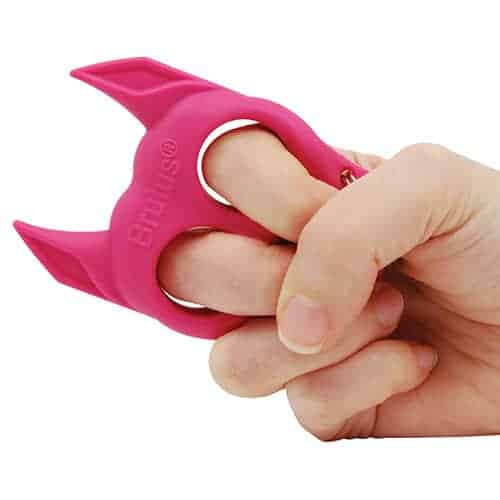pink dog self defense keychain in hand