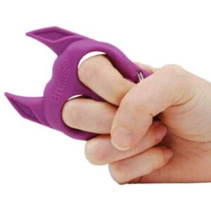 purple dog self defense keychain in hand