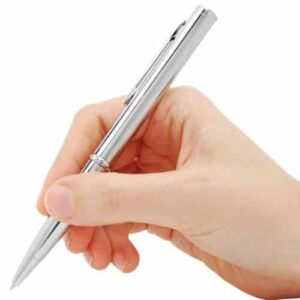silver pen knife in hand